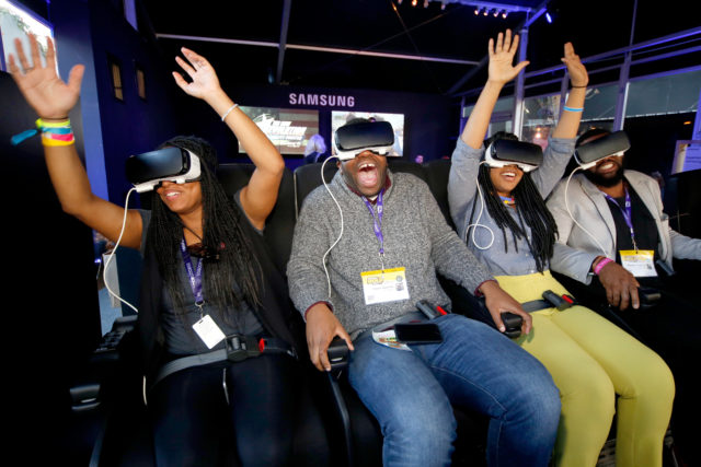 "AUSTIN, TX - MARCH 12: Festival goers experience Samsung Gear VR at The Samsung Studio at SXSW 2016 on March 12, 2016 in Austin, Texas. (Photo by Rick Kern/Getty Images for Samsung)"