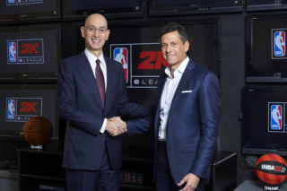 Take-Two CEO Strauss Zelnick, right, joins NBA Commissioner Adam Silver to announce their joint partnership. 