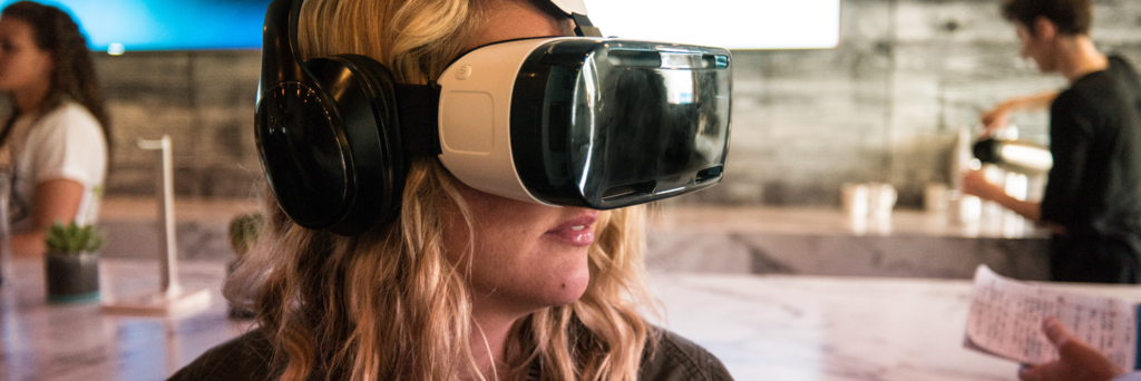 Photo of woman wearing virtual reality headset