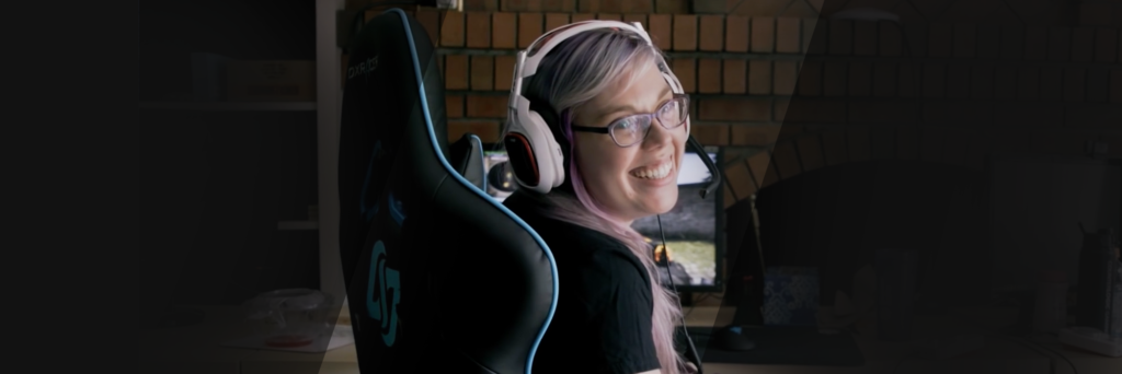 Stephanie Harvey smiling with gaming headset on