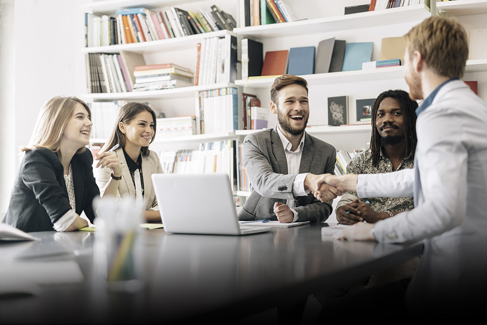 Professionals in conference room discussing business plan