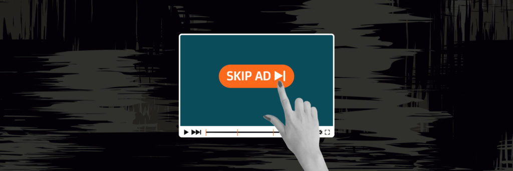 Finger clicking on "Skip Ad" button posted on youtube video
