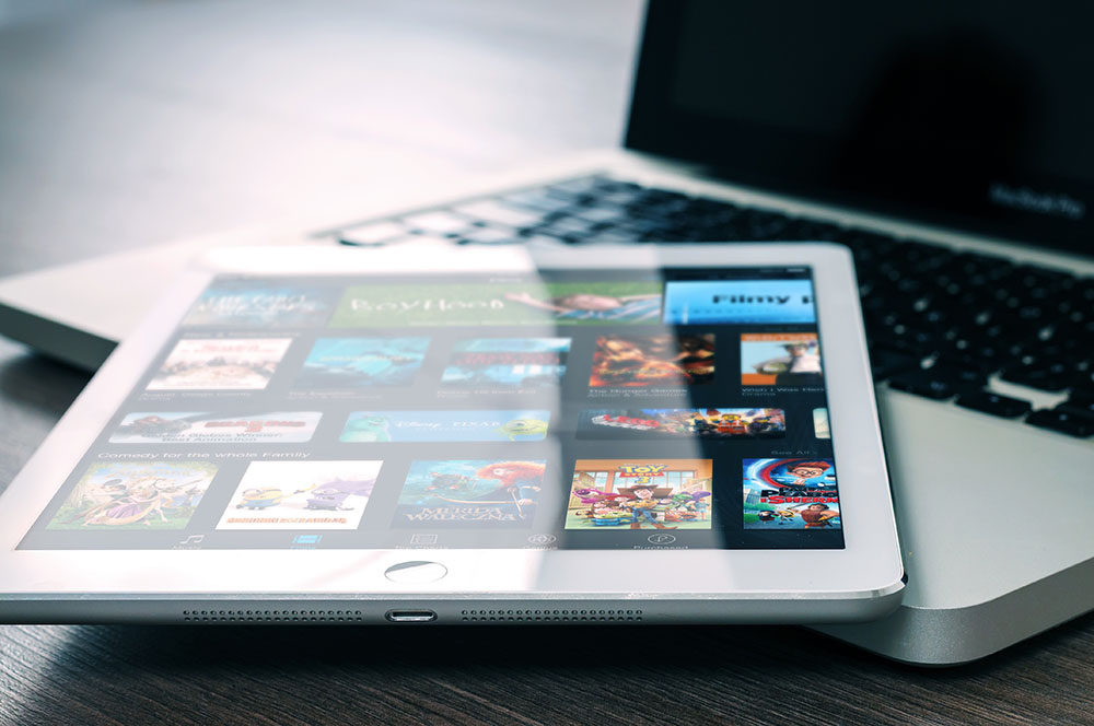 Ipad with Hulu Netflix Youtube app displaying entertainment options
