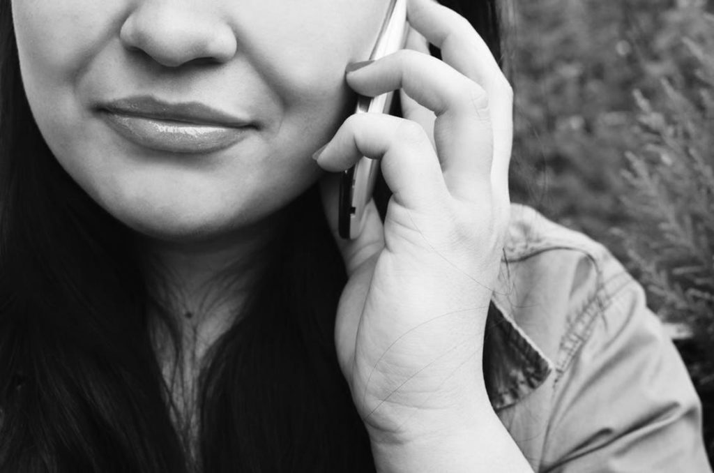 Woman chatting on smartphone