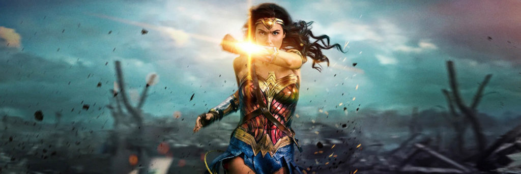 Wonder Woman running towards camera deflecting light