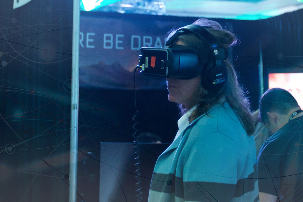 Woman wears Virtual Reality Headset at VRLA