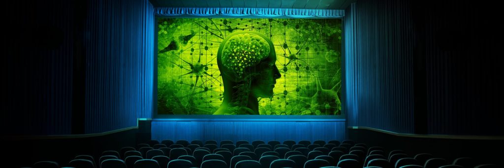 Movie theatre interior displaying Human with extreme imagination on screen