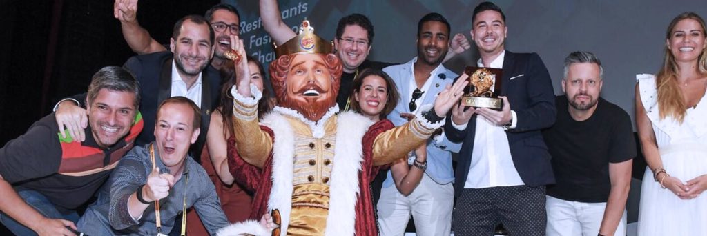 Burger King team onstage celebrating win of award