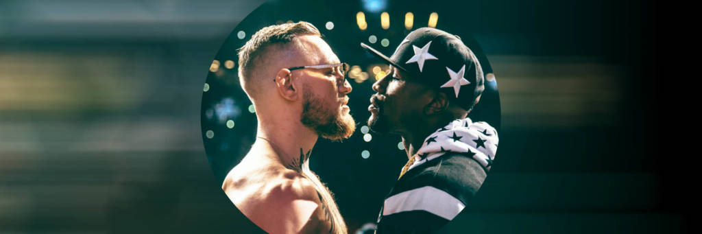 Mayweather and McGregor looking at one another