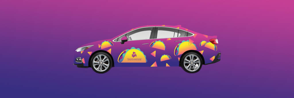 Lyft car with tacobell branding on sides