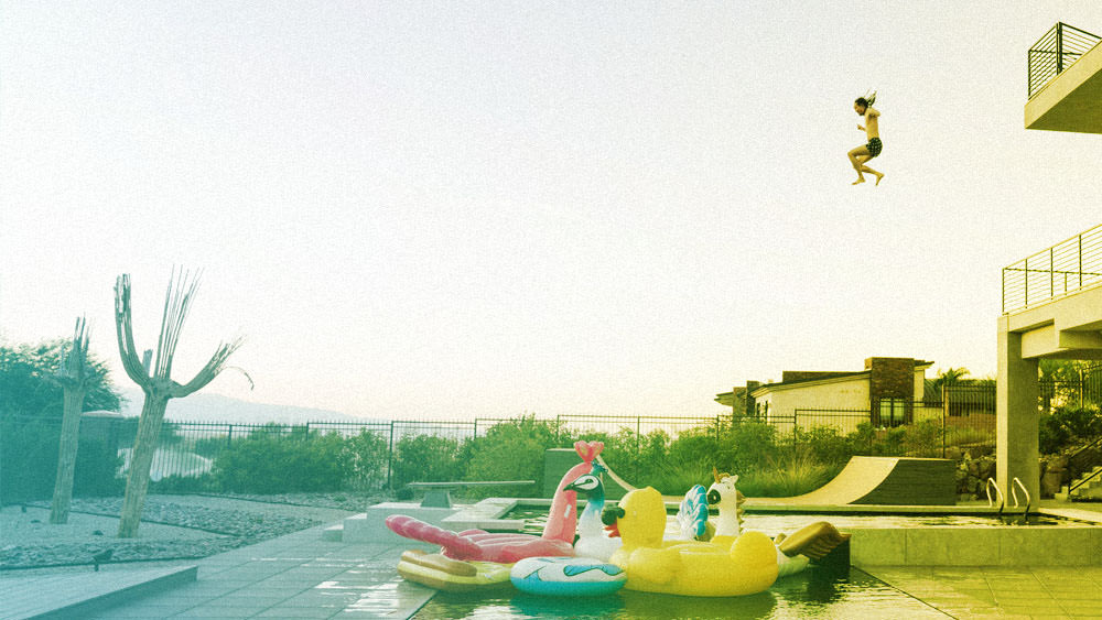 Steve Aoki Diving into a pool