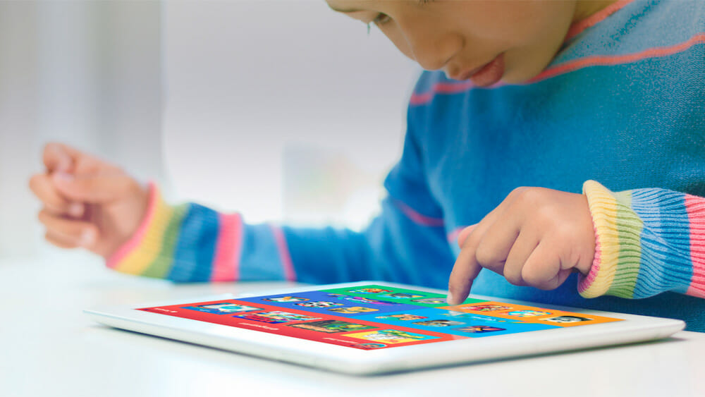 Child uses Fingerprint app on tablet