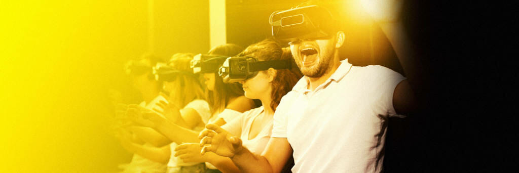 Virtual Reality being used in a group social setting