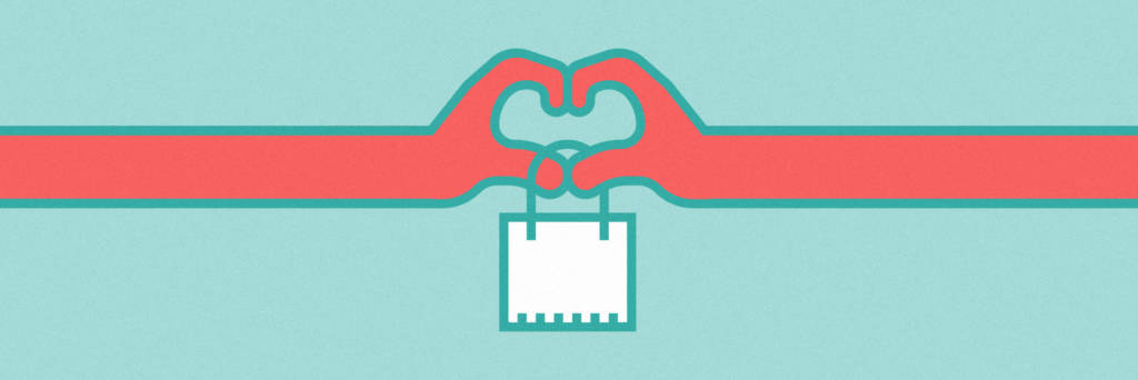 happy consumer, hands in heart formation holding shopping bag