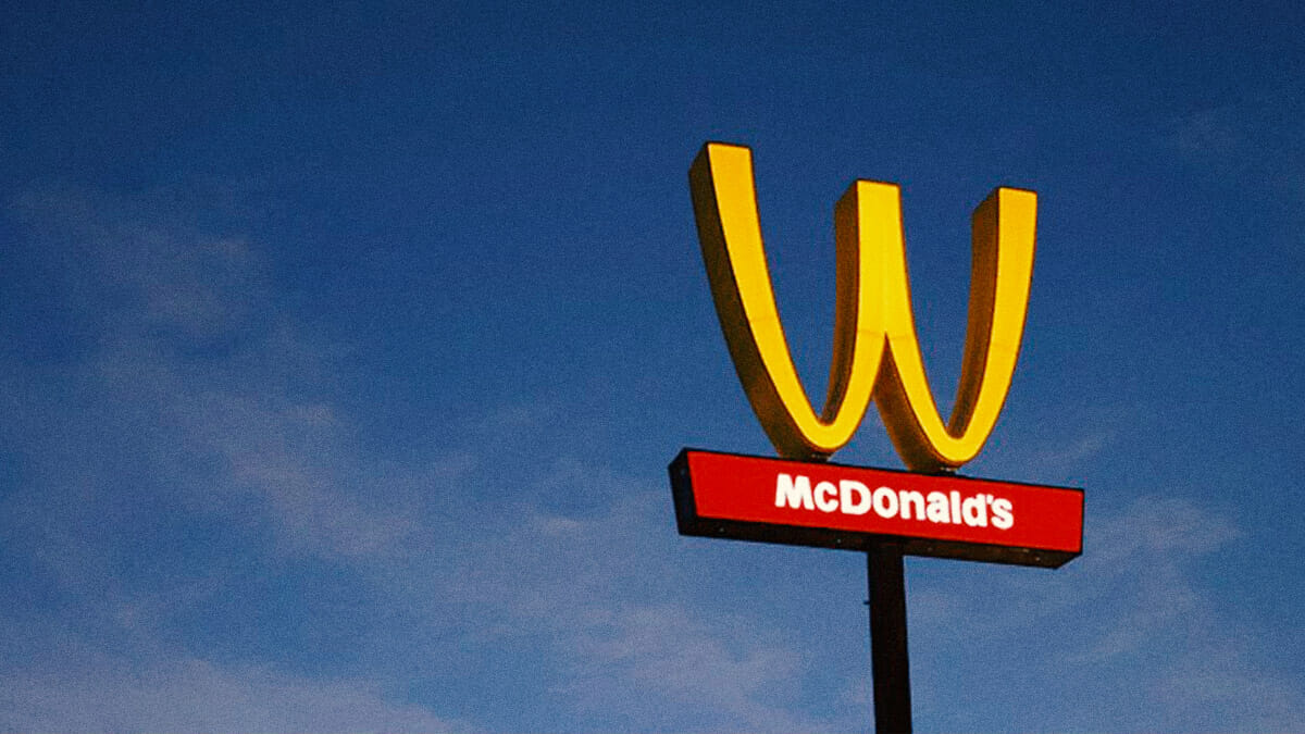 McDonald's Inverted Logo Stood For 'Women,' But Critics Demand 'Wages'