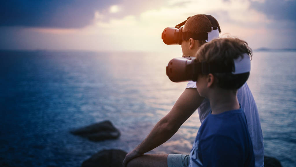 Children using VR headsets in a scenic location