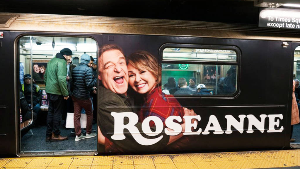 Photo by Craig Ruttle - Exterior of Subway train showing Roseanne Logo