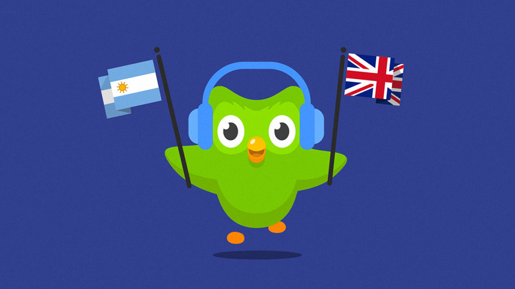 Duolingo owl mascot holding foreign flags
